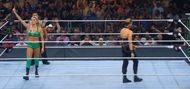 Charlotte Flair flipping off the WWE Universe